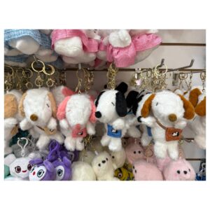 Llavero peluches snoopy con cartera