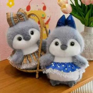 Falda de 35 cm color sable dorado con diseño de pingüino